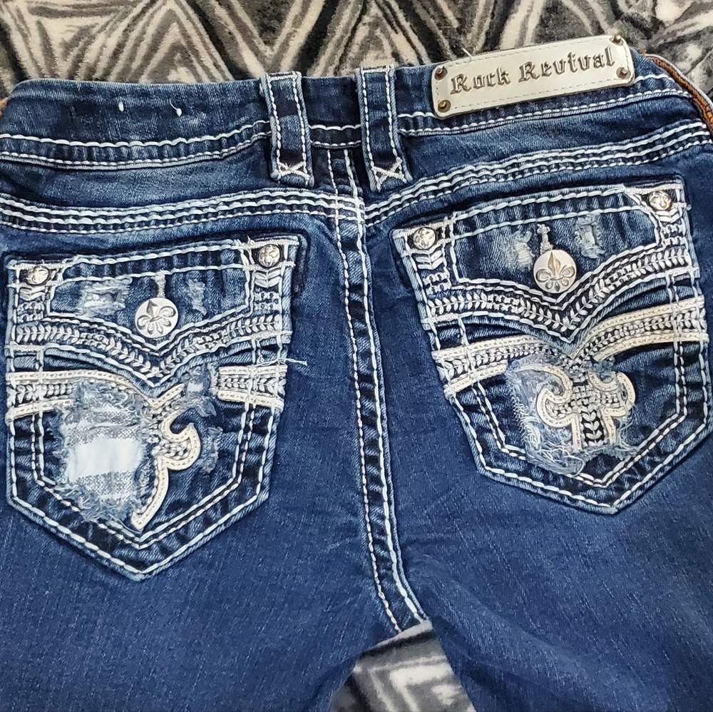 Rock Revival Distressed Blue Jeans with Embellished Pockets